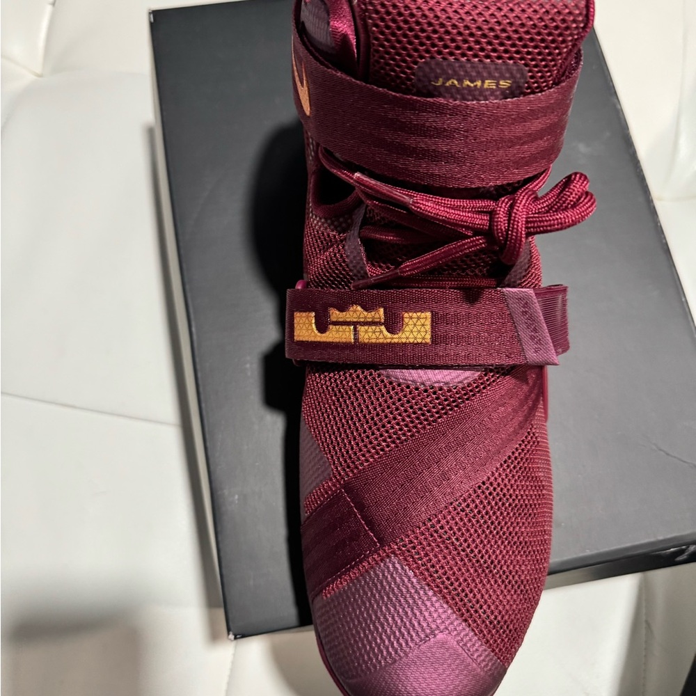 Nike Red and Gold Sneakers with Sleek Design